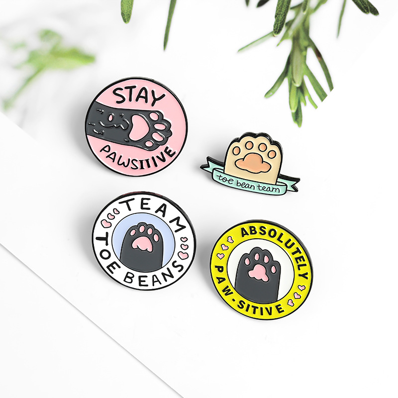 Button pins for backpacks